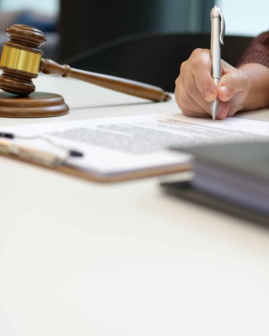 Gavel and legal documents in a courtroom
