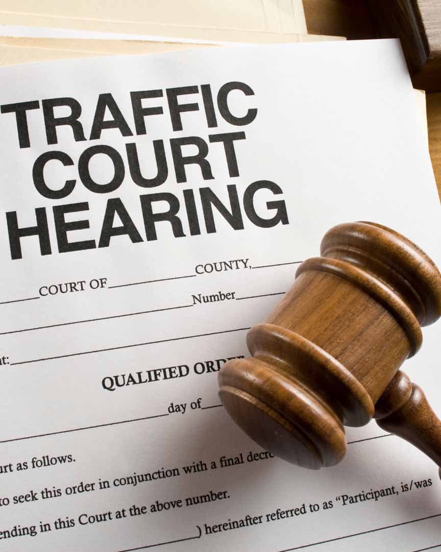 Speeding ticket on a vehicle dashboard